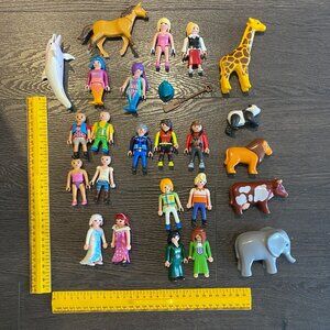 LOT OF ASSORTED PLAYMOBIL FIGURES / ANIMALS SOLD AS IS